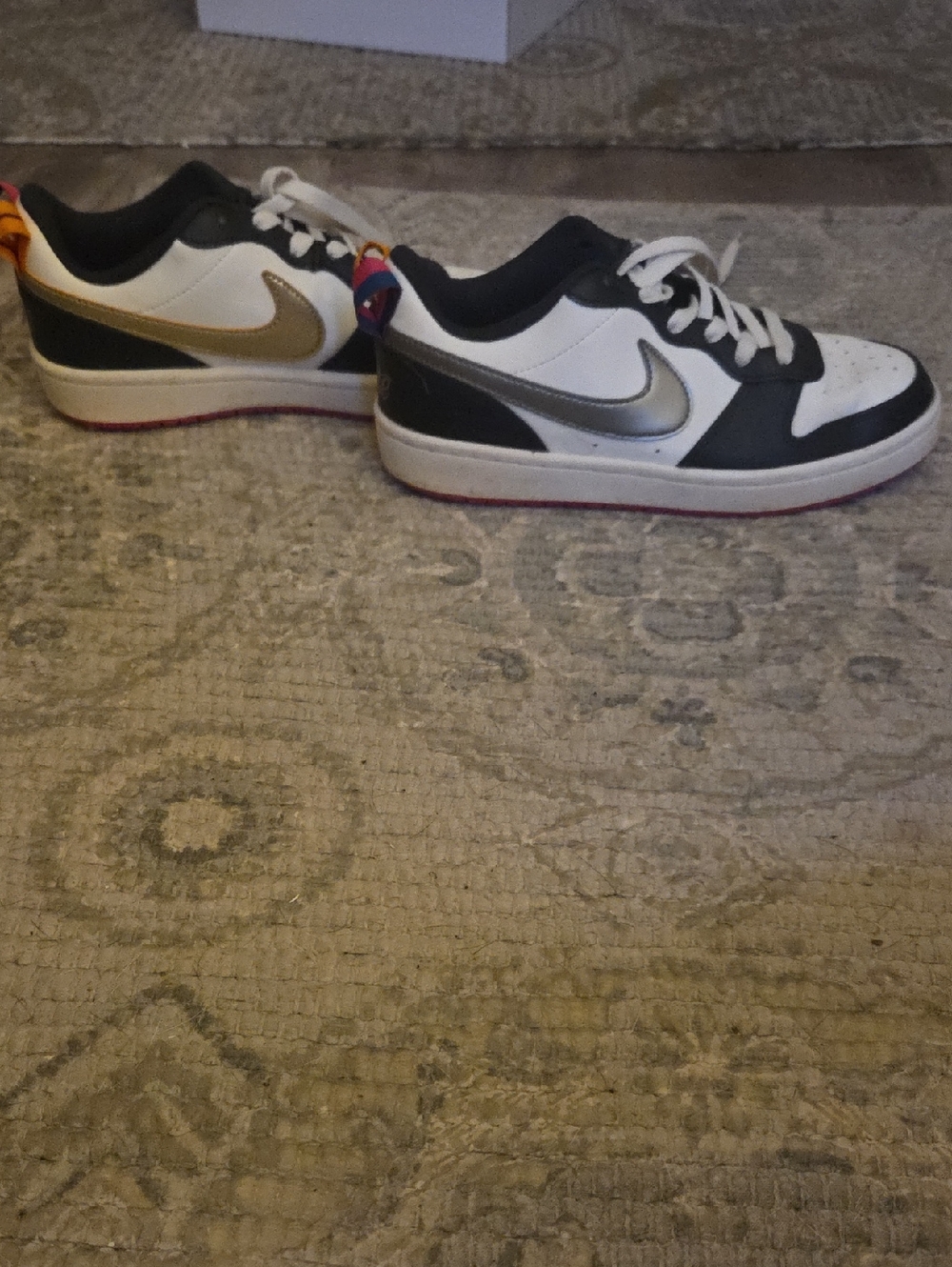 Nike Low-Top Sneakers in White, Black & Metallic (Gold & Silver Swooshes)